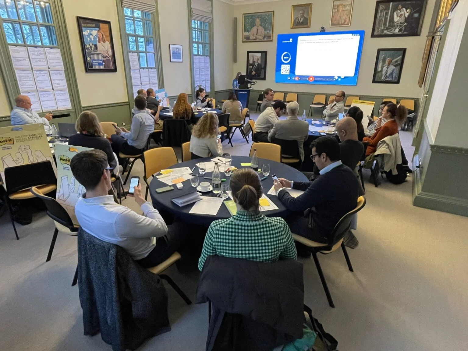 Researchers and policy specialists discussing future energy demand.